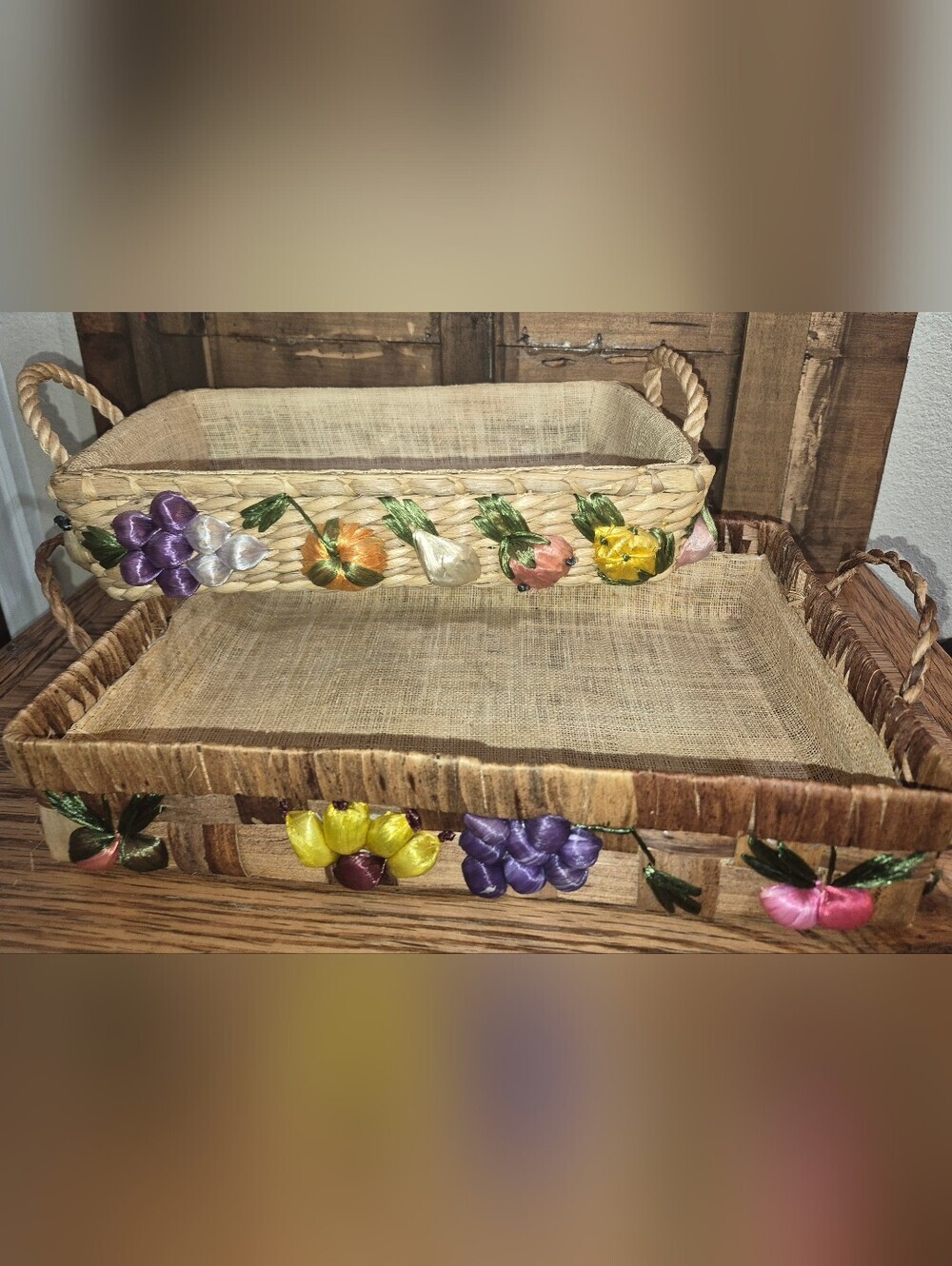 2 Vintage Raffia Woven Casserole Carriers decorated w/colorful embroidered fruit